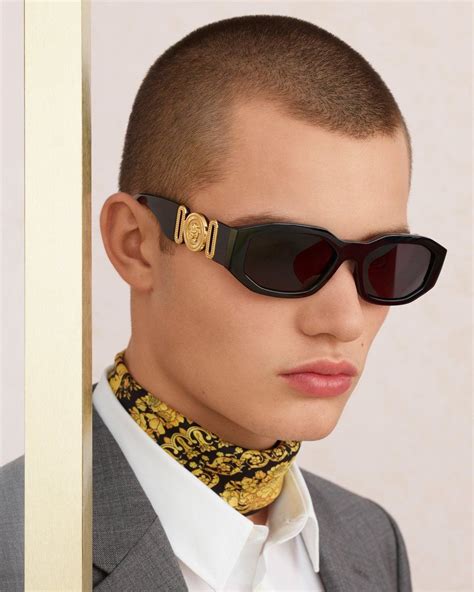 wearing versace glasses
